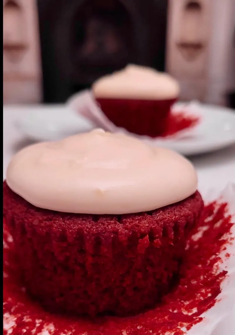 Close-up of red velvet sponge with cream cheese frosting